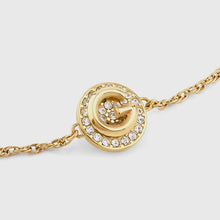Carica l&#39;immagine nel visualizzatore di Gallery, Bracciale da donna in acciaio dorato e cristalli Guess JUBB05 447JW YG
