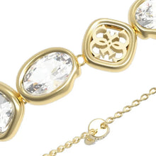 Carica l&#39;immagine nel visualizzatore di Gallery, Bracciale da donna in acciaio dorato e cristalli Guess JUBB05 570JW YG
