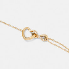 Carica l&#39;immagine nel visualizzatore di Gallery, Bracciale da donna in acciaio dorato e cristalli Guess JUBB05 531JW YG
